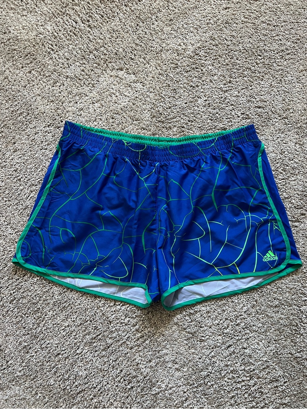 New Adidas Women’s Blue Athletic Shorts with lining.